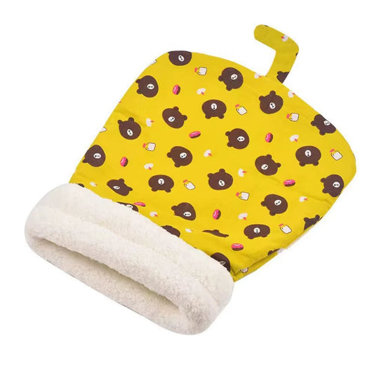 Yellow bear-print cat sleeping bag with a cream fluffy cuff, on white