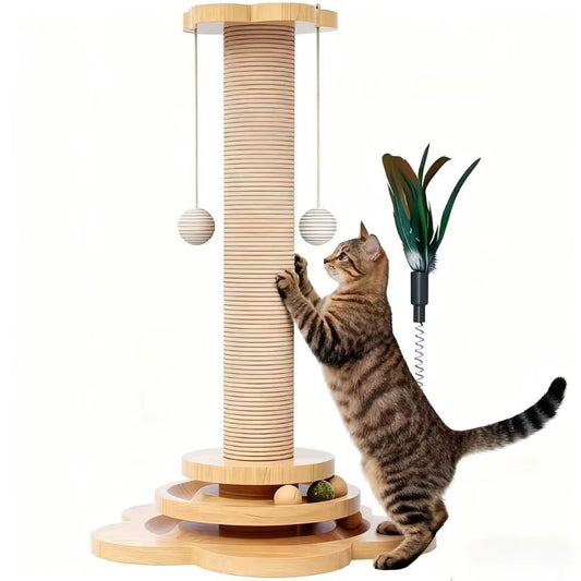 Tabby cat standing up to scratch a rope-wrapped post on a wooden ball-track base, with two hanging balls and a feather teaser on a spring
