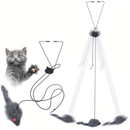 Grey kitten with a raised paw beside the grey furry mouse, its black cord and wire hanger, and a drawing of the mouse swinging below the hanger