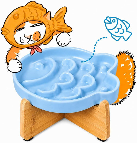 Blue ceramic fish maze cat bowl raised on a bamboo stand
