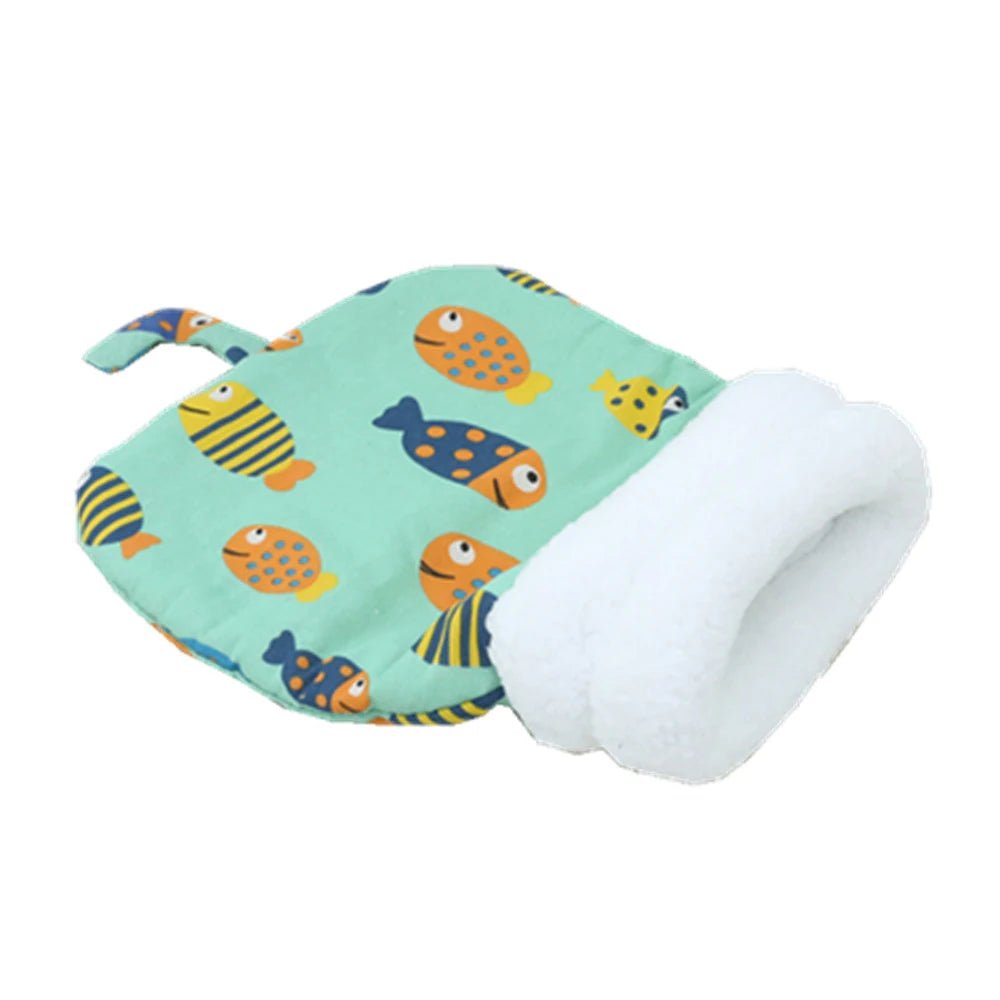 Teal cat sleeping bag printed with orange, blue and yellow fish, with a cream fluffy cuff and a small loop tab, on white