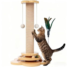 Tabby cat standing up to scratch a rope-wrapped post on a wooden ball-track base, with two hanging balls and a feather teaser on a spring