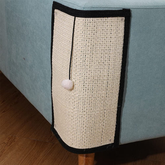 Natural sisal scratch mat fitted around a sofa corner