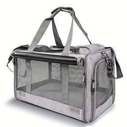 Grey soft-sided cat carrier with mesh panels, a zipped top, grey carry handles and a shoulder strap
