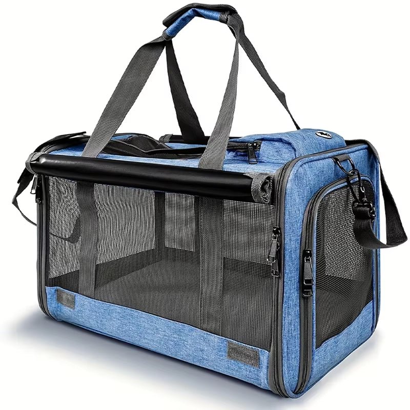 Blue soft-sided cat carrier with mesh panels, a zipped top, grey carry handles and a shoulder strap