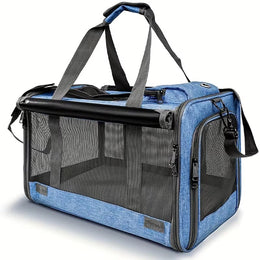 Blue soft-sided cat carrier with mesh panels, a zipped top, grey carry handles and a shoulder strap
